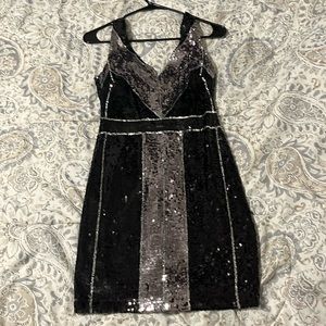 B. Darlin black and silver sparkly mini dress.
